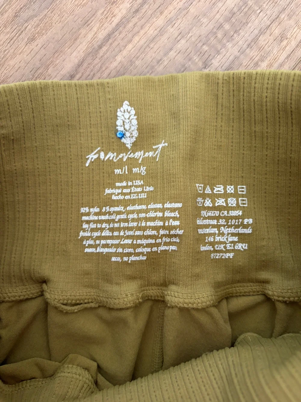 Free People Movement good Karma flare leggings m/L olive green NWOT